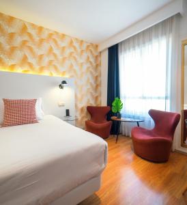 Hotel Cetina Murcia客房内的一张或多张床位