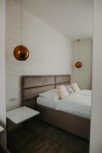 帕特里亚酒店客房内的一张或多张床位