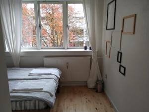 Cozy room Hvidovre客房内的一张或多张床位