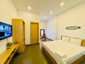 Vitamin Sea Homestay Nha Trang客房内的一张或多张床位