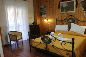 Hotel Lo Scoiattolo客房内的一张或多张床位