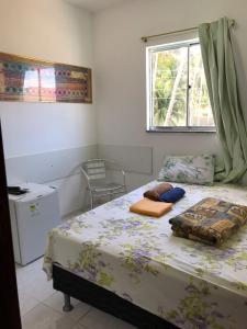 Pousada Tiriri Guesthouse客房内的一张或多张床位