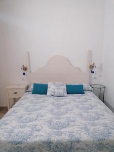 CARBALLO DE PRADO 1900客房内的一张或多张床位