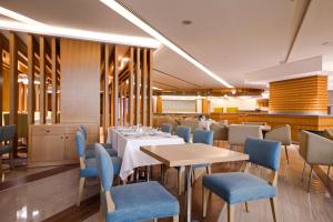 Lavender Hotel Al Nahda Dubai餐厅或其他用餐的地方