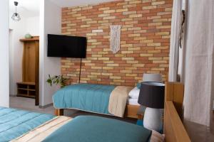 BURINA plant-based residence客房内的一张或多张床位