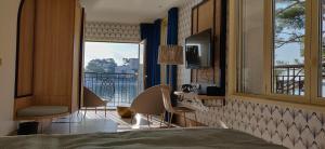 Splendid Hôtel & Spa客房内的一张或多张床位
