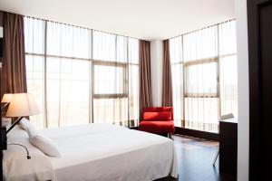 塞尔科蒂尔普拉纳公园酒店客房内的一张或多张床位
