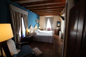 Posada La Llosa de Somo客房内的一张或多张床位