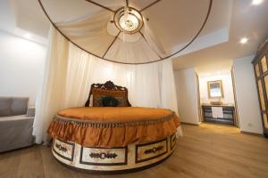 艾利芙汉尼姆Spa及酒店客房内的一张或多张床位