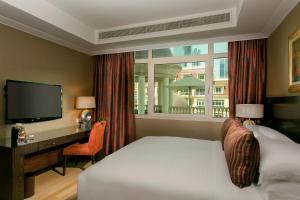 迪拜阿拉穆如瑞士酒店客房内的一张或多张床位