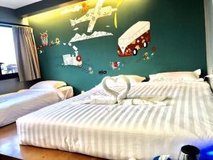 HOOT Hostel & Ratchada客房内的一张或多张床位