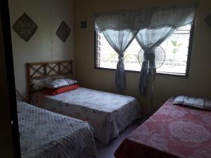 Mulu D cave homestay客房内的一张或多张床位