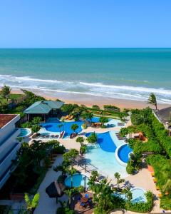 纳塔尔Vogal Luxury Beach Hotel & SPA的享有海滩度假村的空中景致
