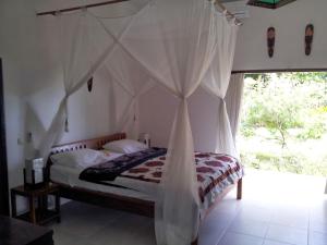 Villa Mangga at Bali Beach客房内的一张或多张床位
