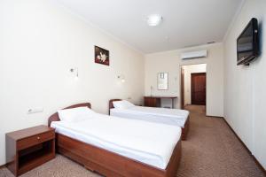 奥特拉达黑海酒店客房内的一张或多张床位