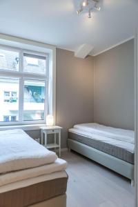 Forenom Serviced Apartments Bergen City客房内的一张或多张床位