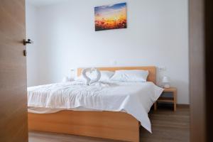 PJagodic Apartments & Wellness客房内的一张或多张床位