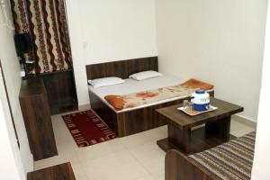 Jain Residency客房内的一张或多张床位