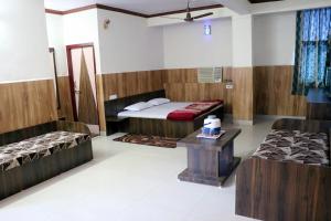 Jain Residency客房内的一张或多张床位