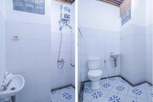 SUPER OYO 1755 De'balcon Accomodation Near Ngurah Rai Airport的一间浴室
