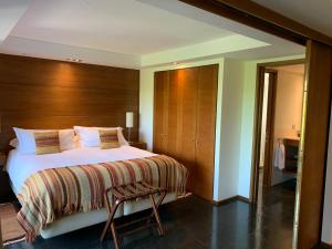 Hotel Playa Grande Suites客房内的一张或多张床位