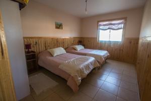 Cabañas Piedra Grande客房内的一张或多张床位