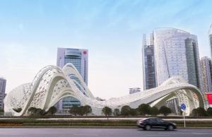 武汉武汉华美达光谷大酒店（温德姆集团全球最佳华美达酒店）的一辆汽车驶过城市的一座白桥