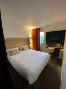 The Originals City, Hôtel Agora, Nantes Ouest (Inter-Hotel)客房内的一张或多张床位