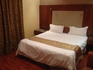 贝特阿尔阿曼尼套房酒店客房内的一张或多张床位