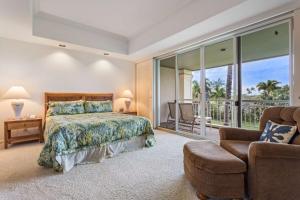 The Islands at Mauna Lani Point - CoralTree Residence Collection客房内的一张或多张床位