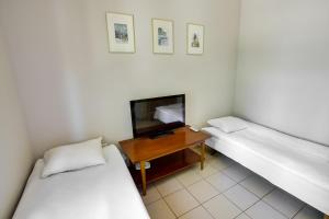 Riga Academic Guest House客房内的一张或多张床位