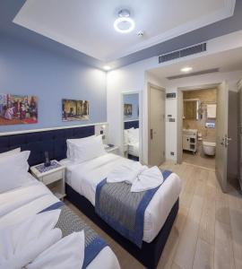OBAHAN HOTEL-Special Class客房内的一张或多张床位