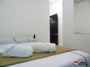 Hotel El Descanso客房内的一张或多张床位