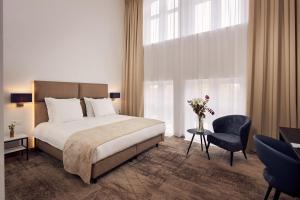 Van der Valk Hotel Mechelen客房内的一张或多张床位