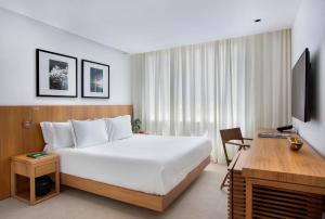 JANEIRO Hotel客房内的一张或多张床位