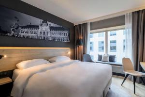 Radisson Hotel Antwerp Berchem客房内的一张或多张床位