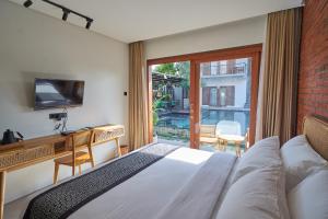 库布热带旅馆客房内的一张或多张床位