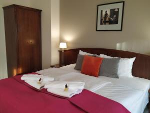 斯塔勒米亚斯托老城酒店客房内的一张或多张床位