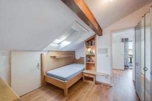 Alpenblick客房内的一张或多张床位