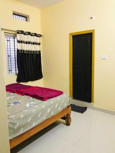 Rohit Home Stay客房内的一张或多张床位