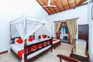 Chami Villa Bentota客房内的一张或多张床位