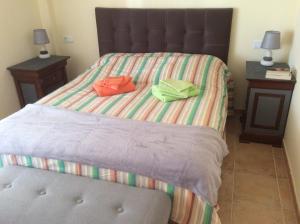 Costa Esuri Ayamonte Apartment客房内的一张或多张床位