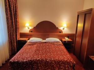 Hotel Amalia客房内的一张或多张床位