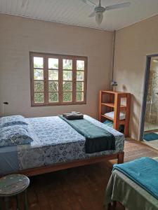 Pouso do Beija-flor客房内的一张或多张床位