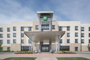 阿马里洛Holiday Inn Express & Suites Amarillo West, an IHG Hotel的酒店前方的 ⁇ 染