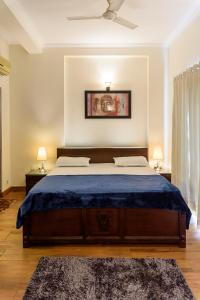 Beautiful Apartments at Tarudhan Valley Golf Resort, Manesar客房内的一张或多张床位