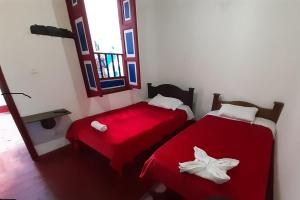 EL COCUY - HOSTAL-CHOCUY客房内的一张或多张床位