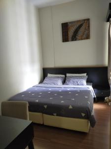 CT Homestay at Lagoon Park Resort客房内的一张或多张床位