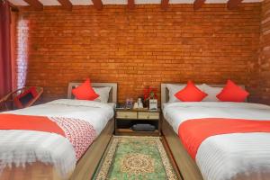 Kathmandu Cottage - Boutique客房内的一张或多张床位