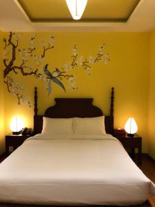 Le Grand Hanoi Hotel - The Oriental客房内的一张或多张床位